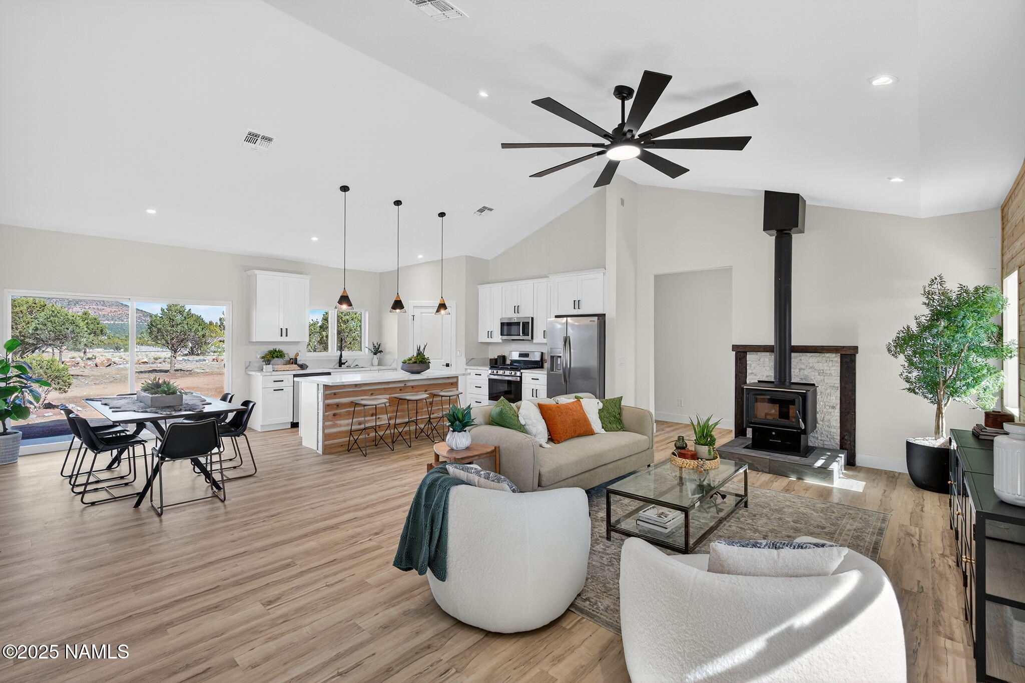 7943 North Red Lake Road Williams, AZ 86046 - Photo 14 of 33 a living room with furniture and a large window
