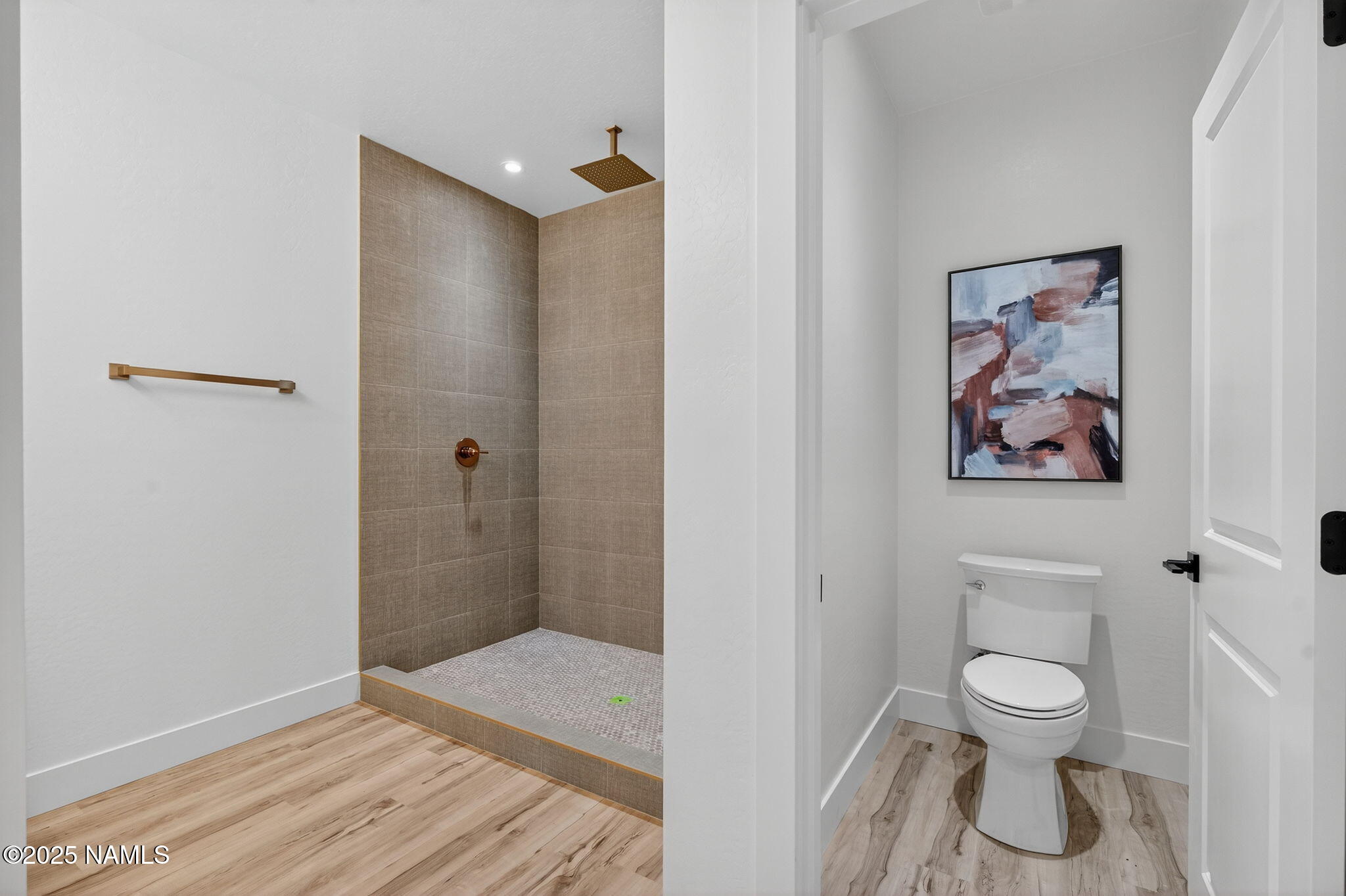 7943 North Red Lake Road Williams, AZ 86046 - Photo 22 of 33 a bathroom with a toilet and a shower