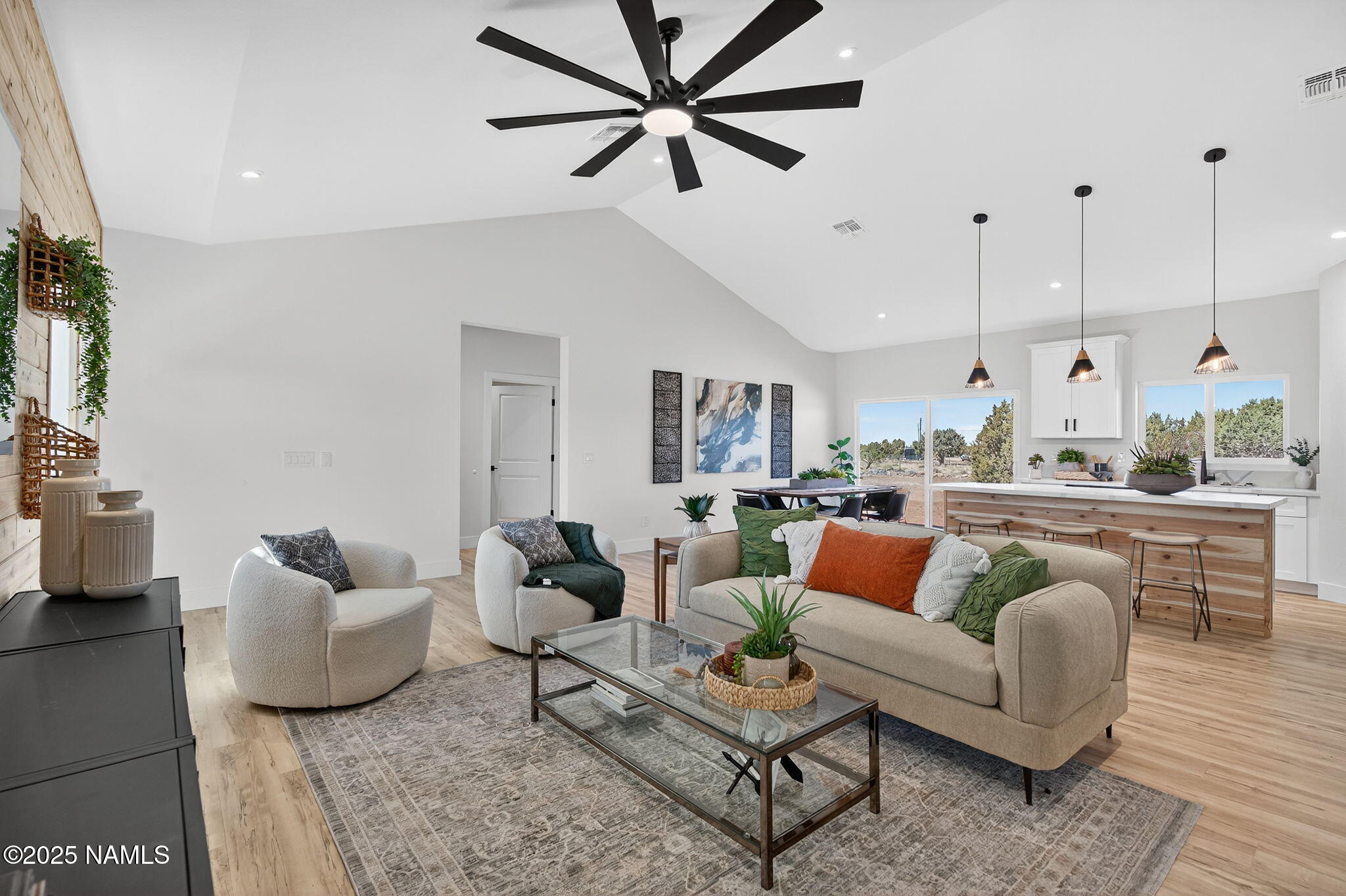 7943 North Red Lake Road Williams, AZ 86046 - Photo 7 of 33 a living room with furniture and a large window