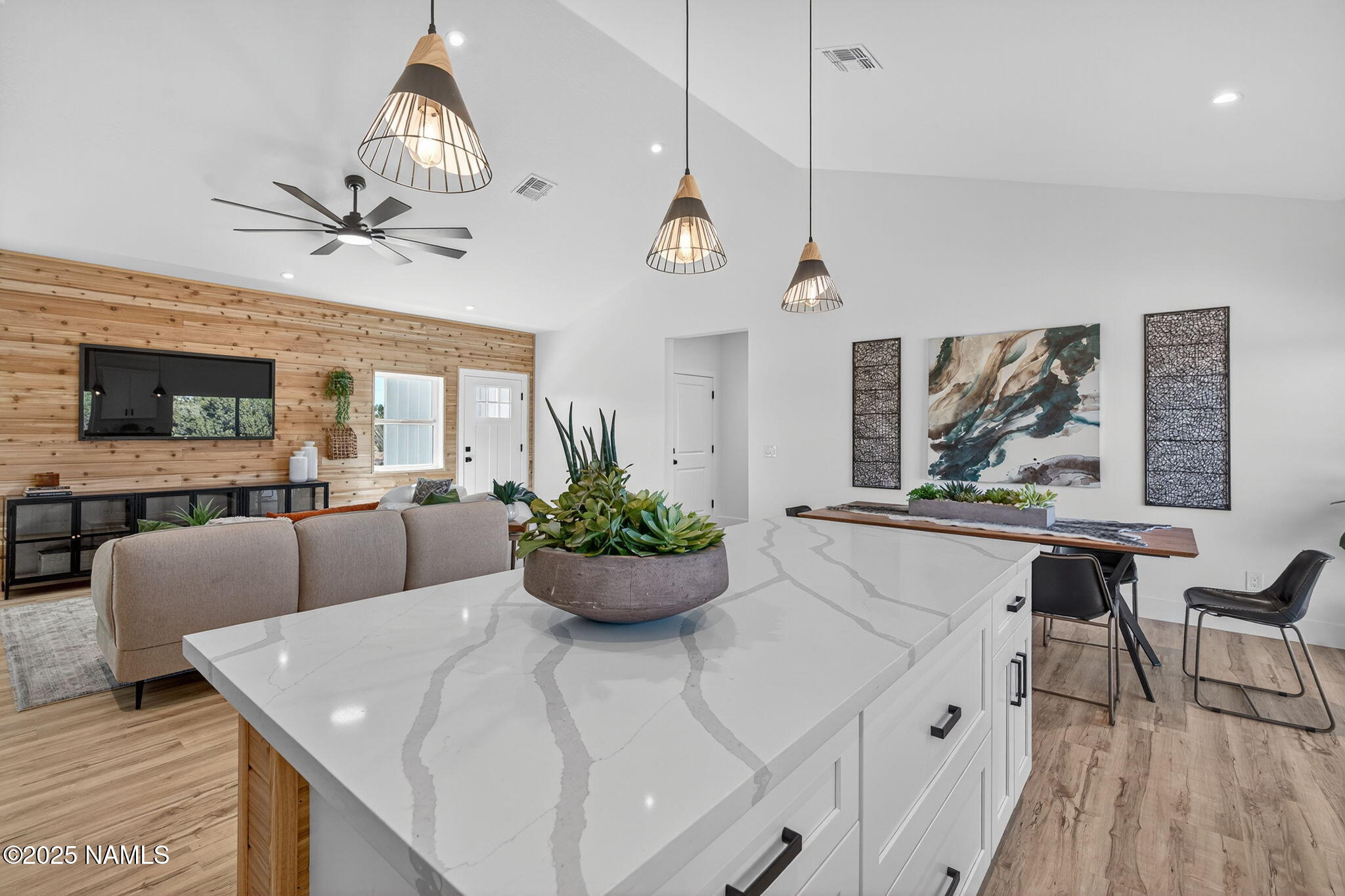 7943 North Red Lake Road Williams, AZ 86046 - Photo 10 of 33 a kitchen with a dining table and chairs