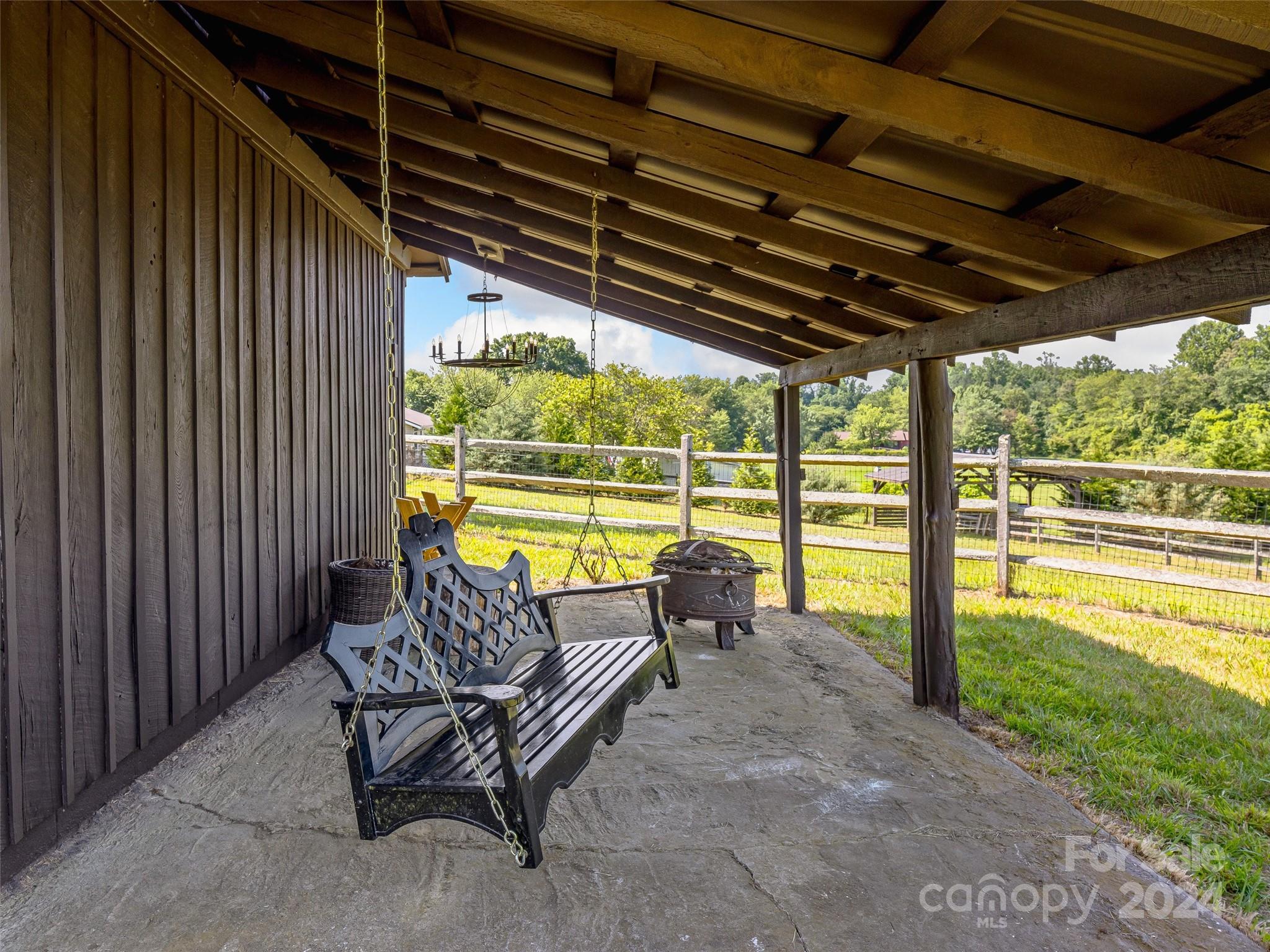 529 Pace Road Hendersonville, NC 28792 - Photo 27 of 35 a view of a chairs and table in the patio