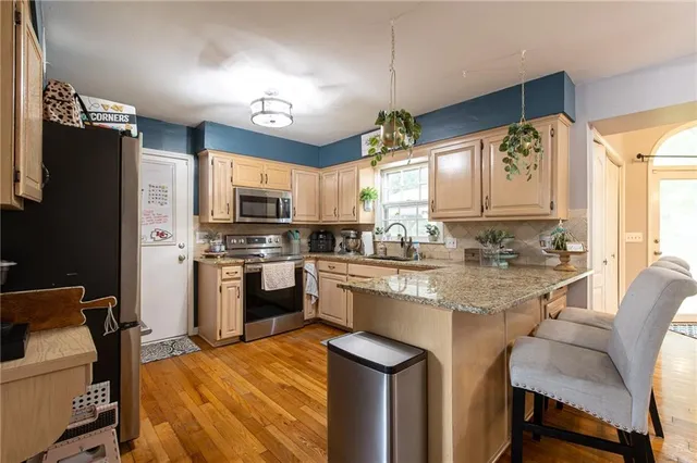 $434,000 | 3743 Northeast Woodland Court, Lee's Summit, MO 64064