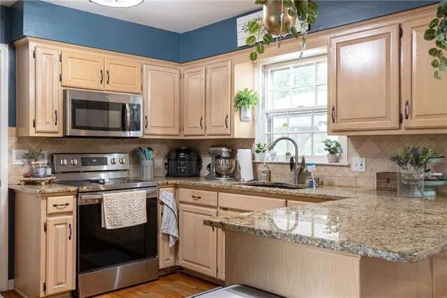 $434,000 | 3743 Northeast Woodland Court, Lee's Summit, MO 64064