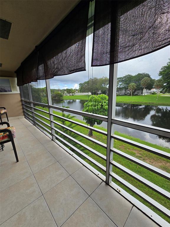 229 Durham East, Unit 229 Deerfield Beach, FL 33442 - Photo 17 of 64 a view of outdoor space with seating