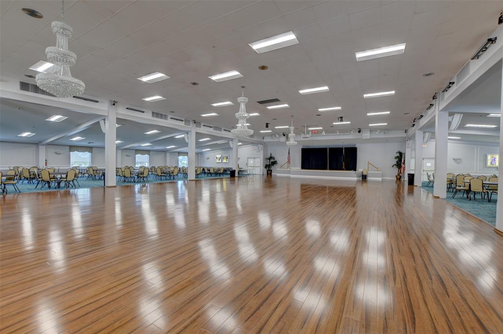 229 Durham East, Unit 229 Deerfield Beach, FL 33442 - Photo 40 of 64 a view of a lobby with black and white walls