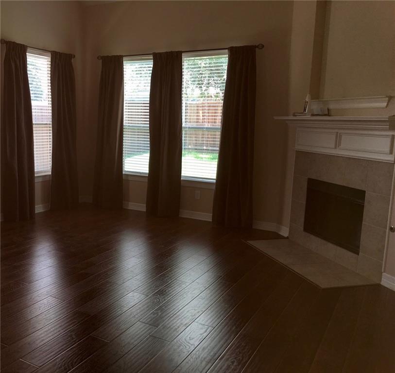 5720 Pebble Ridge Drive McKinney, TX 75070 - Photo 8 of 24 Family room with laminated flooring