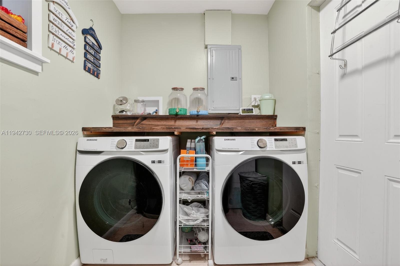 6970 Southwest 24th Street Miramar, FL 33023 - Photo 31 of 39 a utility room with dryer and washer