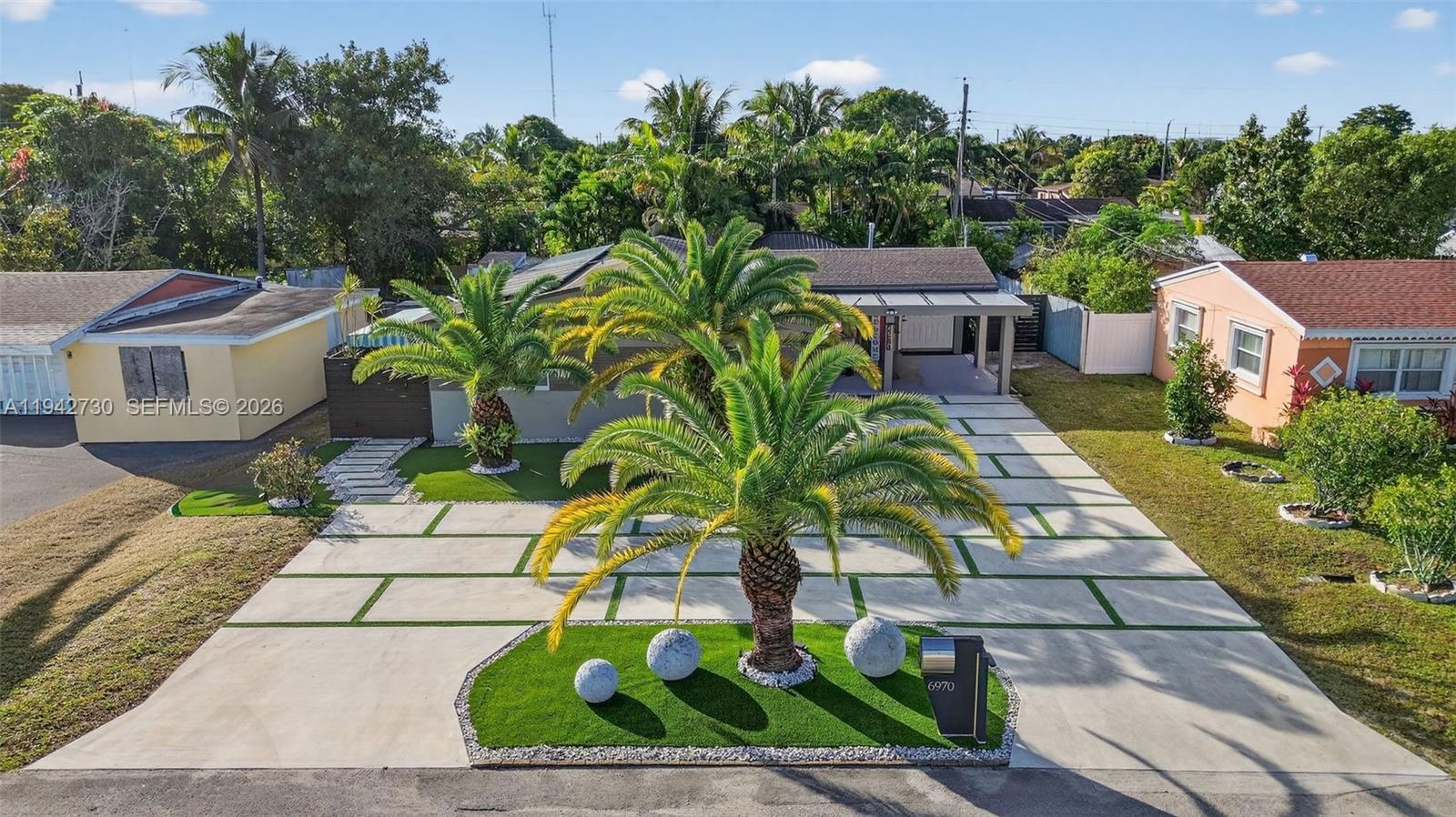 6970 Southwest 24th Street Miramar, FL 33023 - Photo 33 of 39 an aerial view of a house with a yard