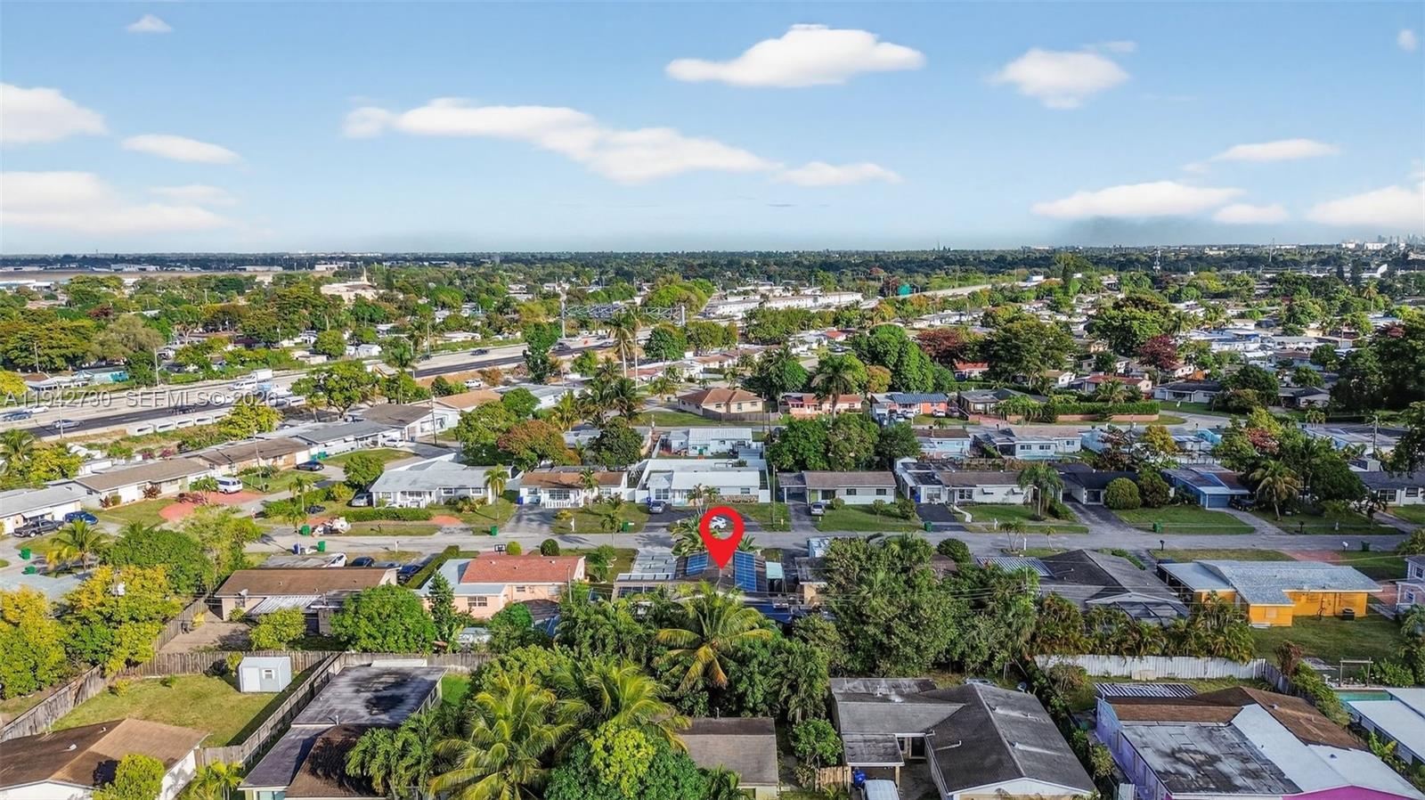 6970 Southwest 24th Street Miramar, FL 33023 - Photo 36 of 39 an aerial view of residential building and lake