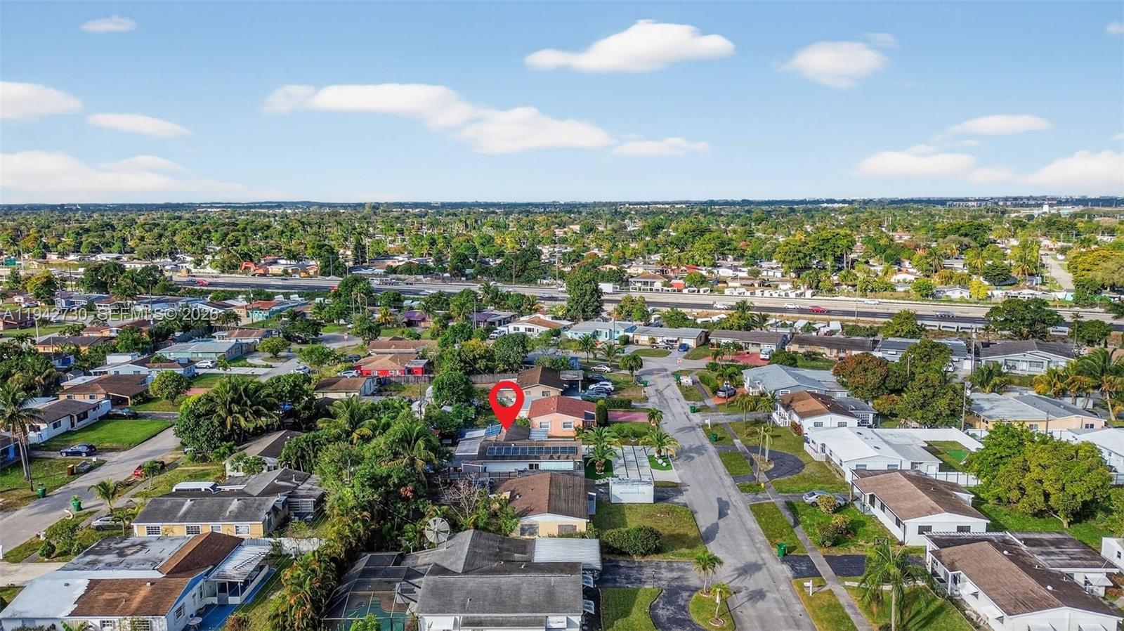 6970 Southwest 24th Street Miramar, FL 33023 - Photo 37 of 39 an aerial view of residential houses with outdoor space and trees