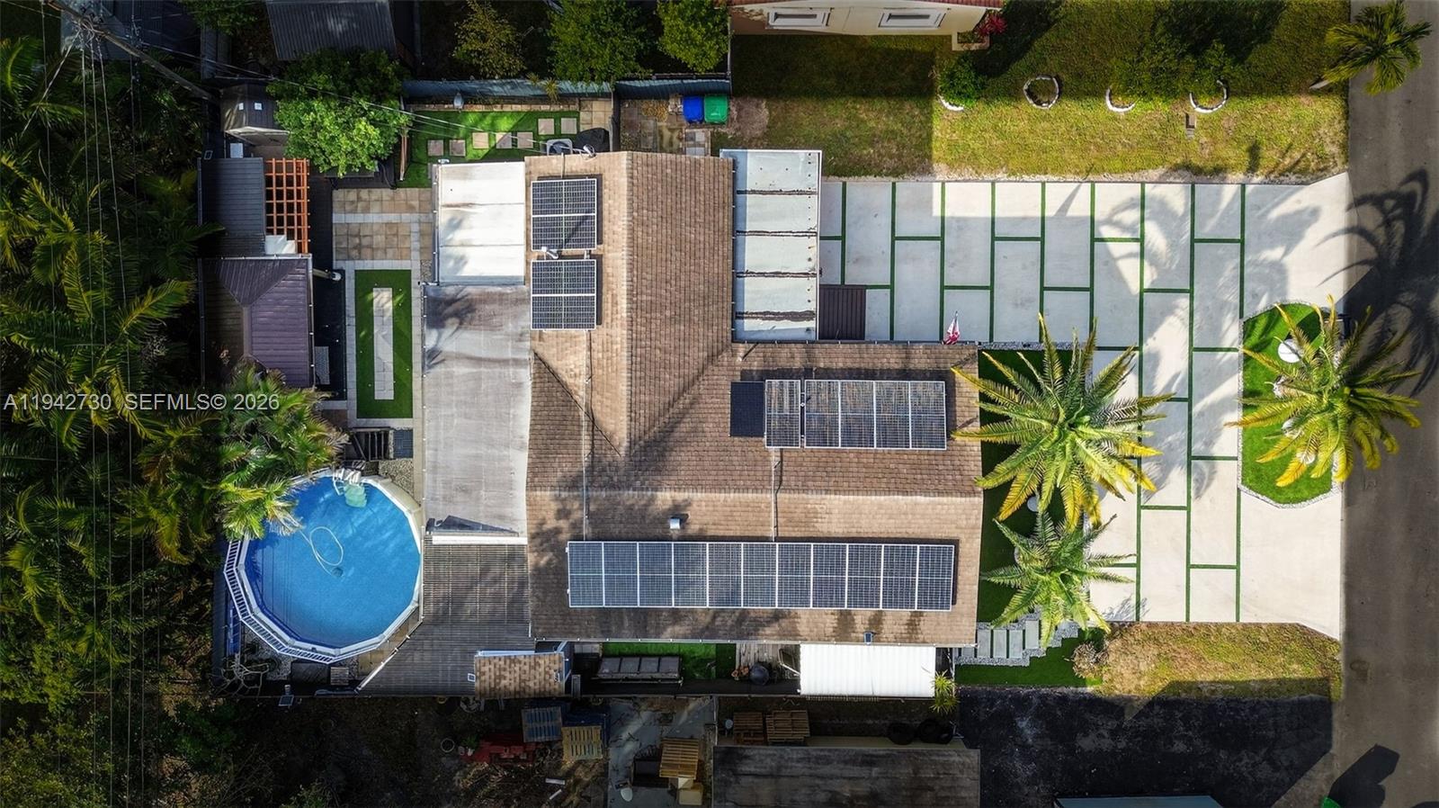 6970 Southwest 24th Street Miramar, FL 33023 - Photo 38 of 39 a view of a chairs and table in the patio