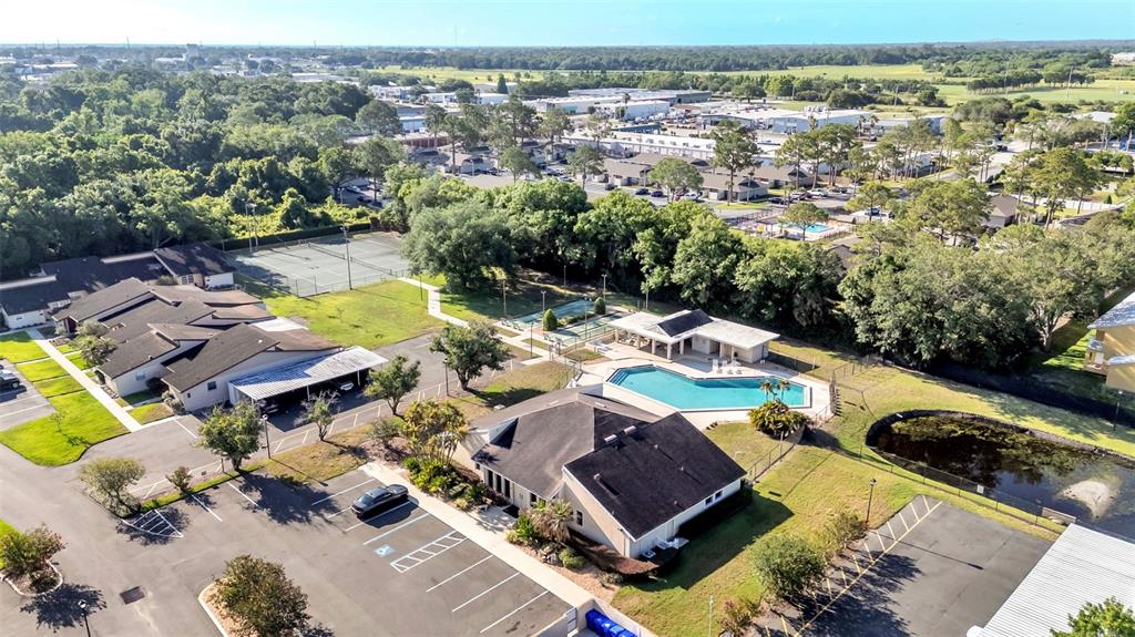 2025 Sylvester Road, Unit N305 Lakeland, FL 33803 - Photo 26 of 34 an aerial view of a house with yard swimming pool and outdoor seating