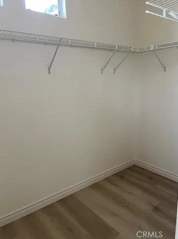 a view of a room with racks on the wall