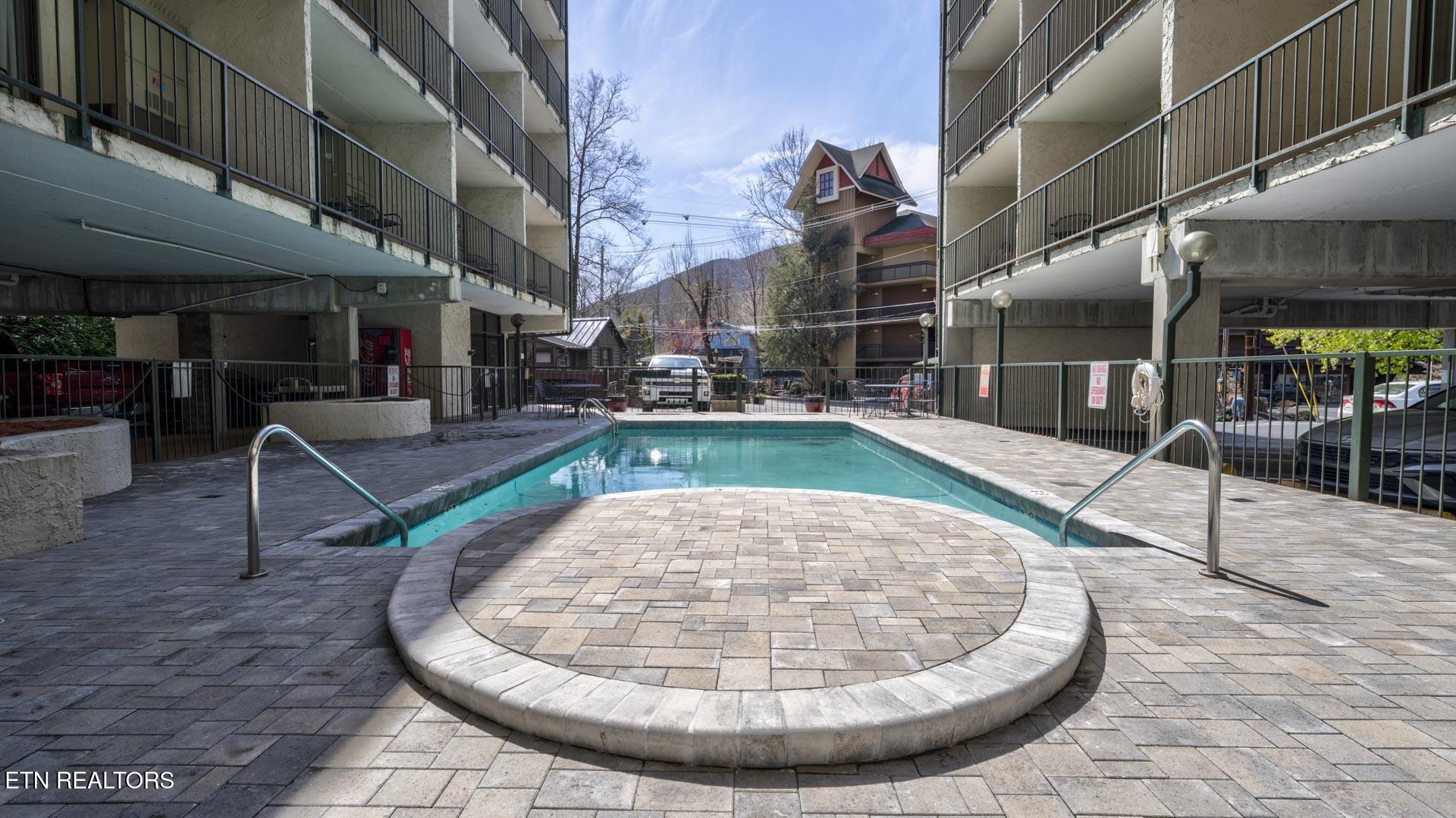685 River Road, Unit 306 Gatlinburg, TN 37738 - Photo 28 of 33 Ottalini Pool Exterior-6