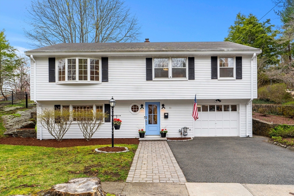 92 Moffatt Road Salem, MA 01970 - Photo 1 of 42 a front view of a house with garden