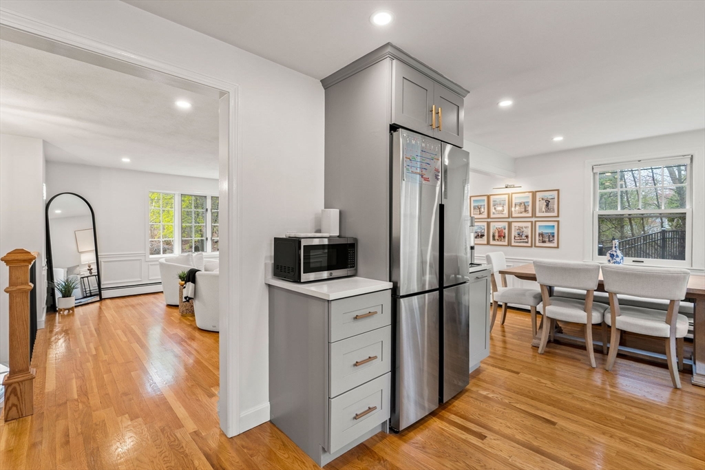 92 Moffatt Road Salem, MA 01970 - Photo 12 of 42 a kitchen with stainless steel appliances granite countertop a refrigerator and a stove top oven