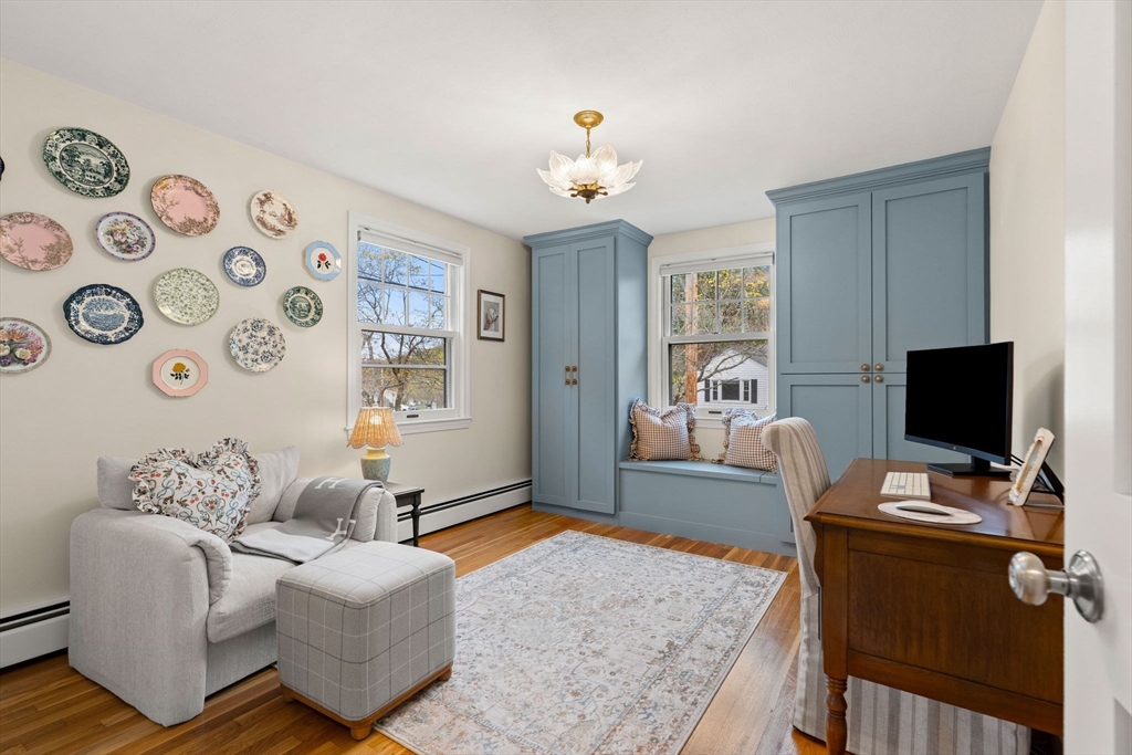 92 Moffatt Road Salem, MA 01970 - Photo 20 of 42 a living room with furniture and a flat screen tv