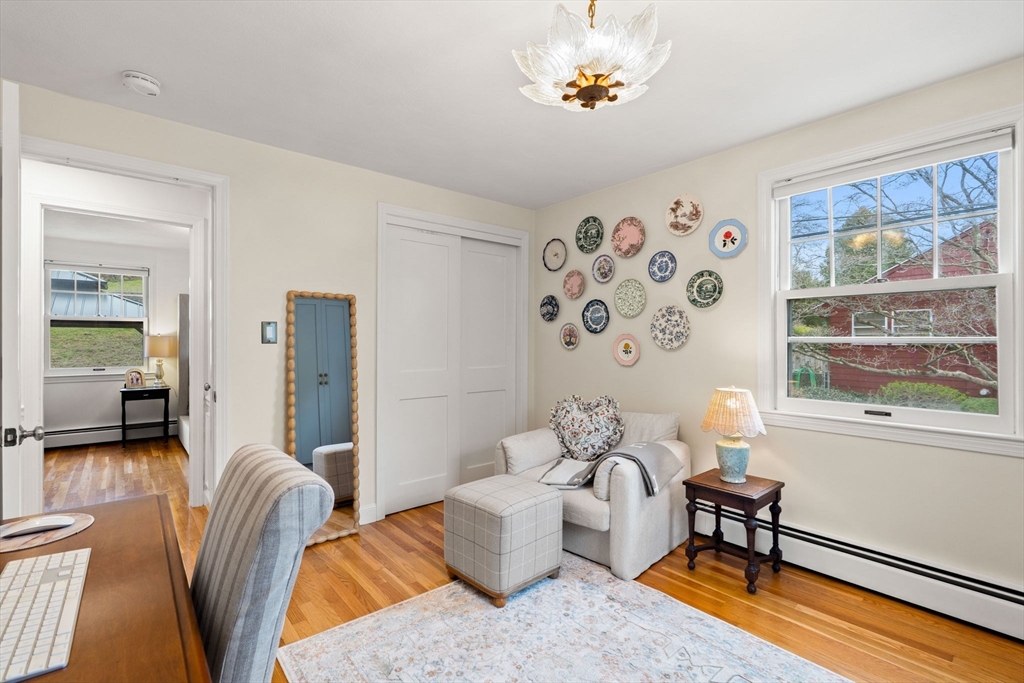 92 Moffatt Road Salem, MA 01970 - Photo 22 of 42 a living room with furniture and a window