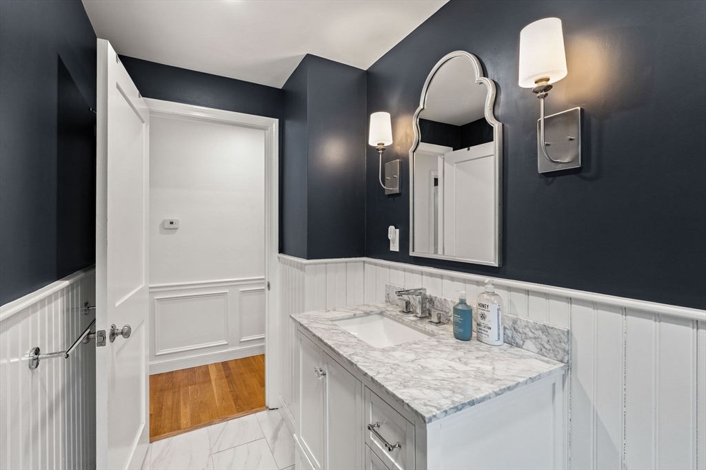 92 Moffatt Road Salem, MA 01970 - Photo 24 of 42 a bathroom with a granite countertop sink and a mirror