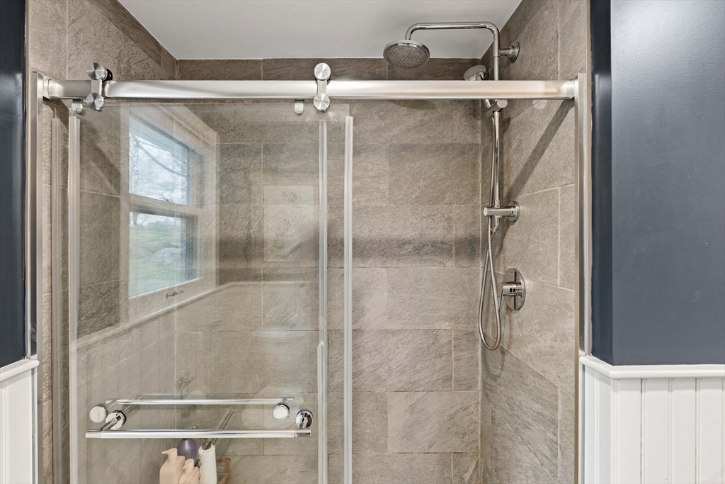 92 Moffatt Road Salem, MA 01970 - Photo 25 of 42 a bathroom with a glass shower door