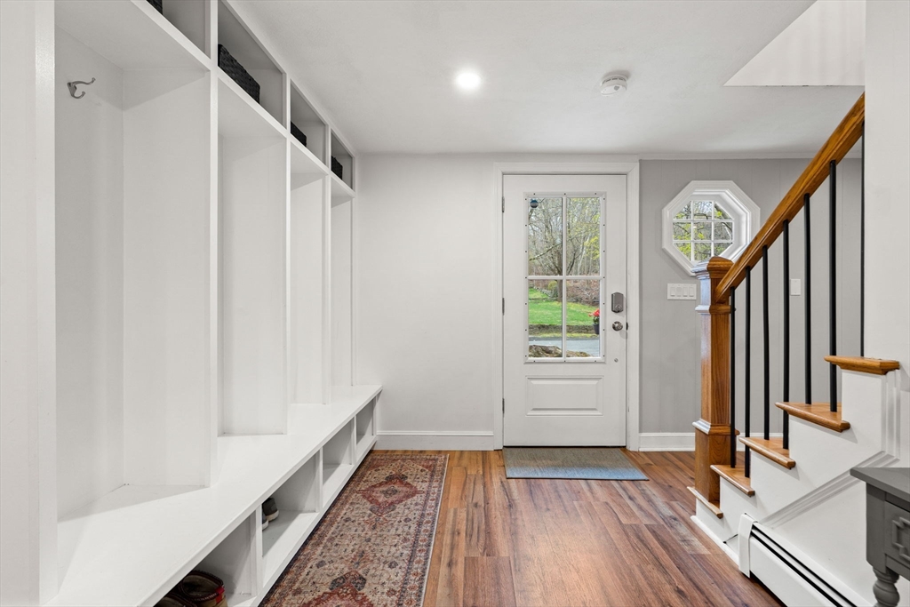 92 Moffatt Road Salem, MA 01970 - Photo 29 of 42 a view of entryway with wooden floor and stairs