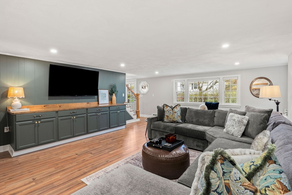 92 Moffatt Road Salem, MA 01970 - Photo 33 of 42 a living room with furniture and a flat screen tv