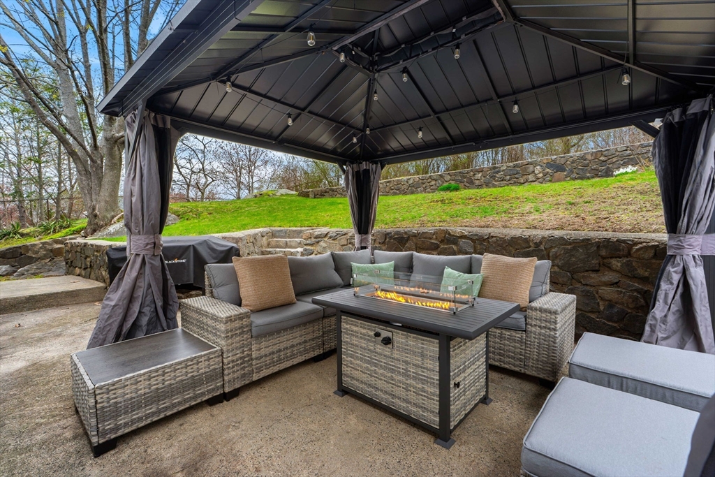 92 Moffatt Road Salem, MA 01970 - Photo 39 of 42 a outdoor living space with patio furniture and a garden