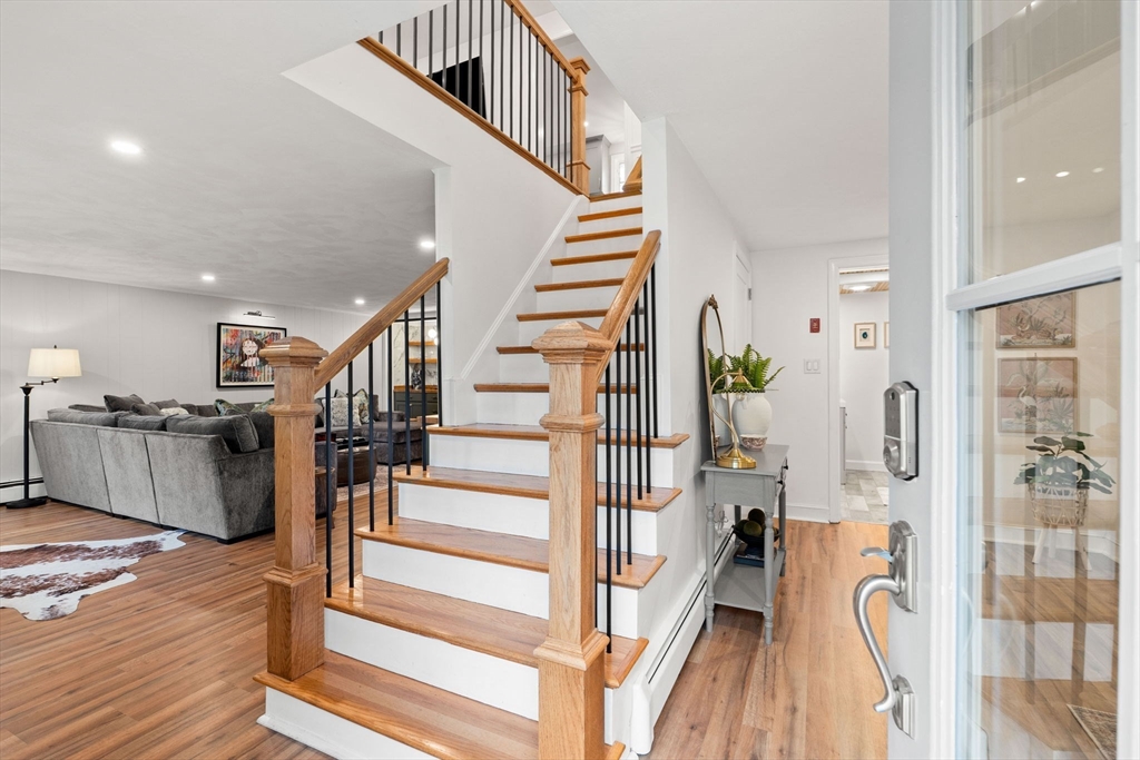92 Moffatt Road Salem, MA 01970 - Photo 4 of 42 a view of entryway and hall with wooden floor