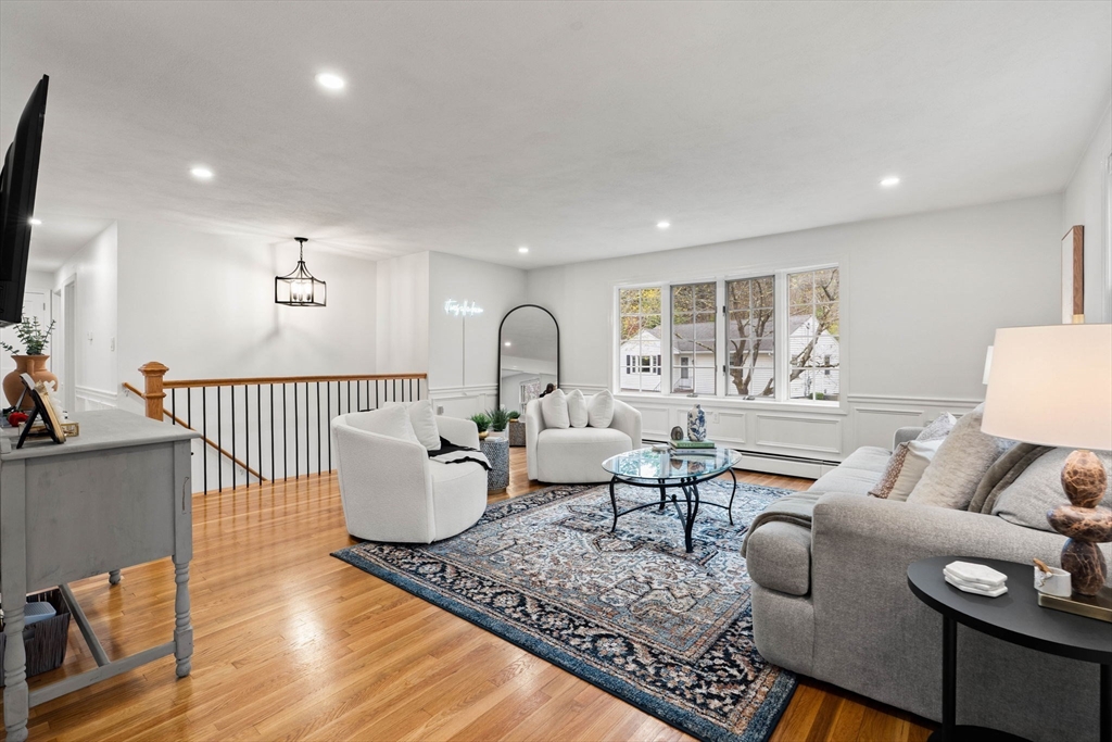 92 Moffatt Road Salem, MA 01970 - Photo 6 of 42 a living room with furniture and wooden floor