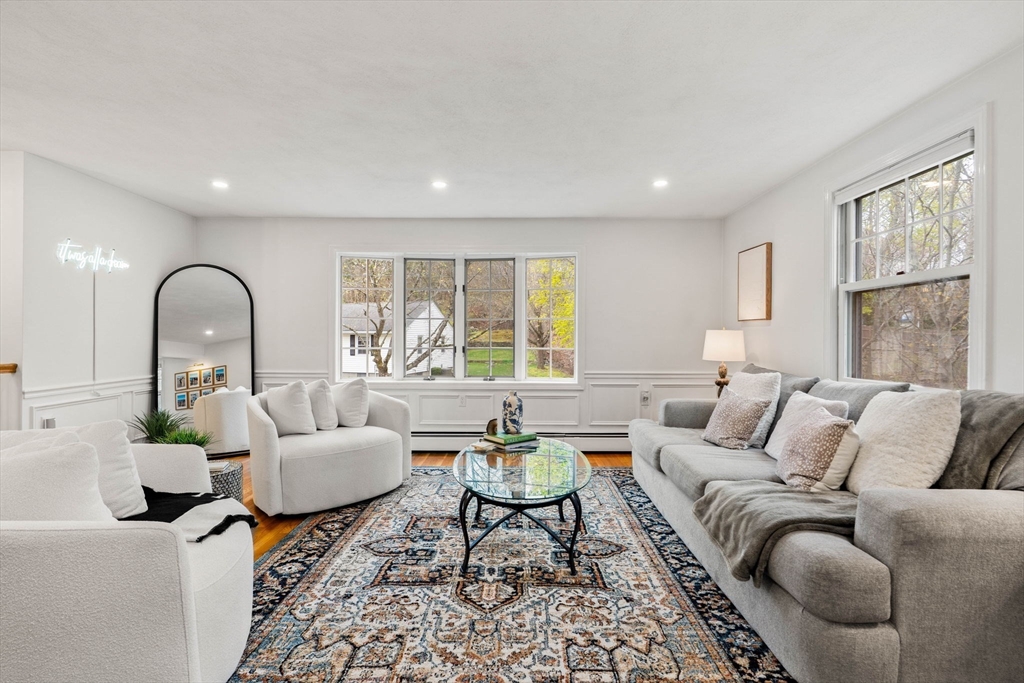 92 Moffatt Road Salem, MA 01970 - Photo 7 of 42 a living room with furniture and a large window