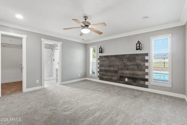 a view of an empty room with a fireplace