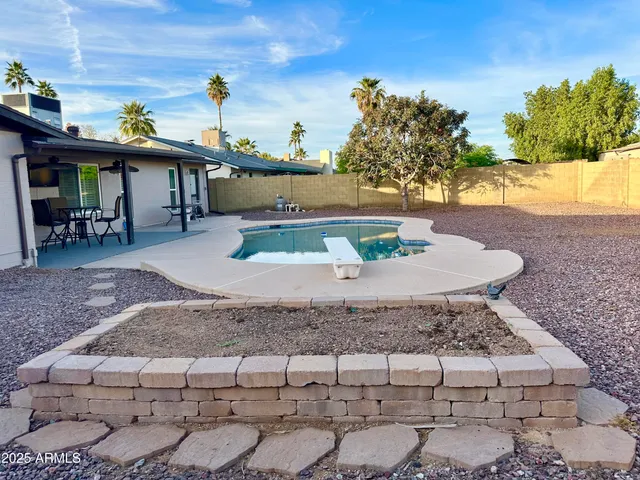 a view of a house with a swimming pool