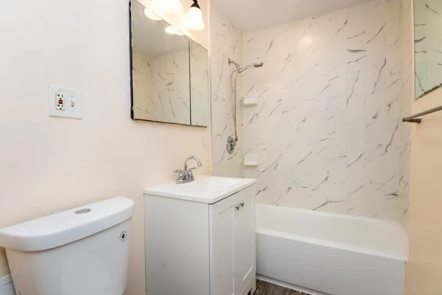 a view of livingroom with washer and dryer
