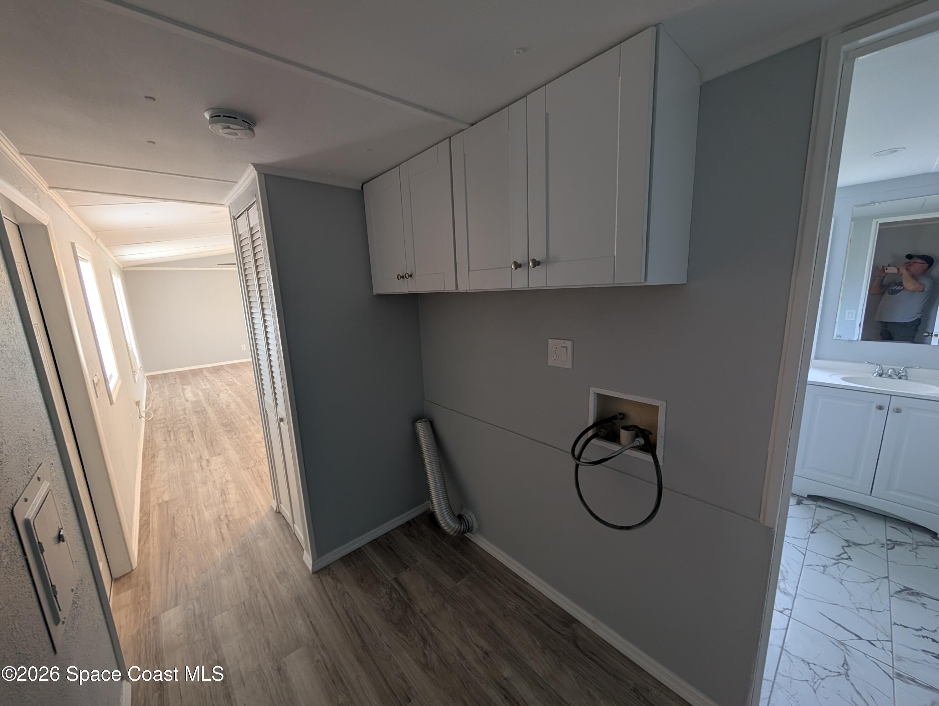 3314 Kittles Street Mims, FL 32754 - Photo 7 of 9 a view of an entryway with wooden floor