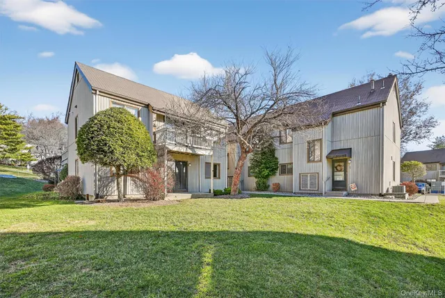 a view of a house with a big yard