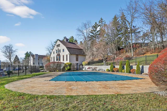 a building with trees in the background
