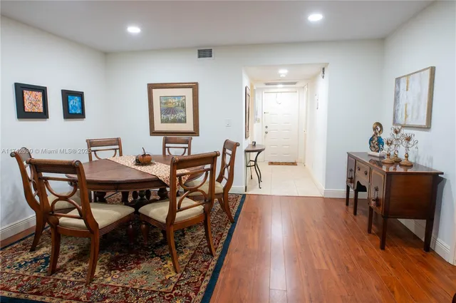 wooden floor with a rug