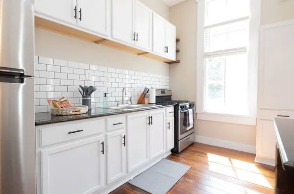 a room with a table and chairs