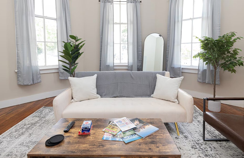 1300 18th Street Columbus, GA 31901 - Photo 21 of 38 a living room with furniture and a potted plant