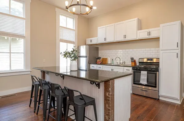 a hallway with a fireplace in it