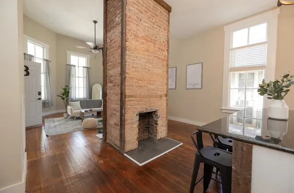 a bathroom with a double vanity sink toilet and shower