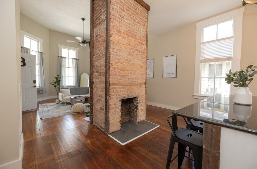 1300 18th Street Columbus, GA 31901 - Photo 27 of 38 a view of a dining room with furniture window and wooden floor