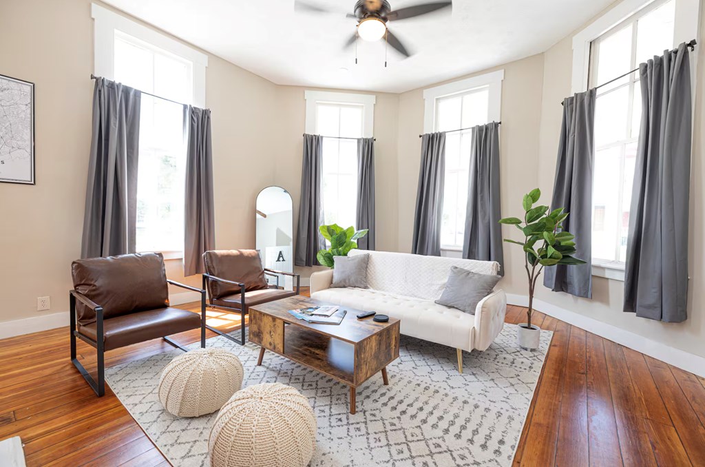 1300 18th Street Columbus, GA 31901 - Photo 7 of 38 a living room with furniture potted plant and a large window