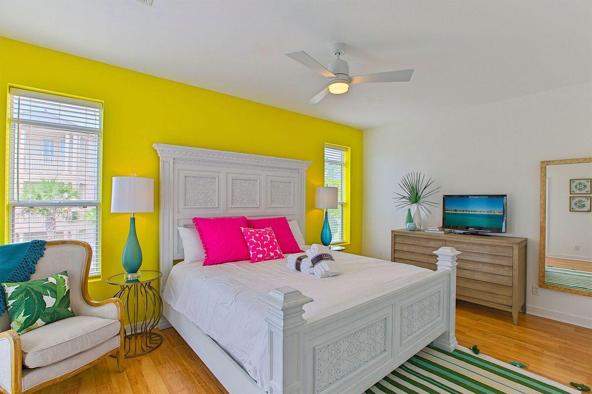 93 West Blue Crab Loop Seacrest, FL 32461 - Photo 12 of 34 a bedroom with a bed and a couch