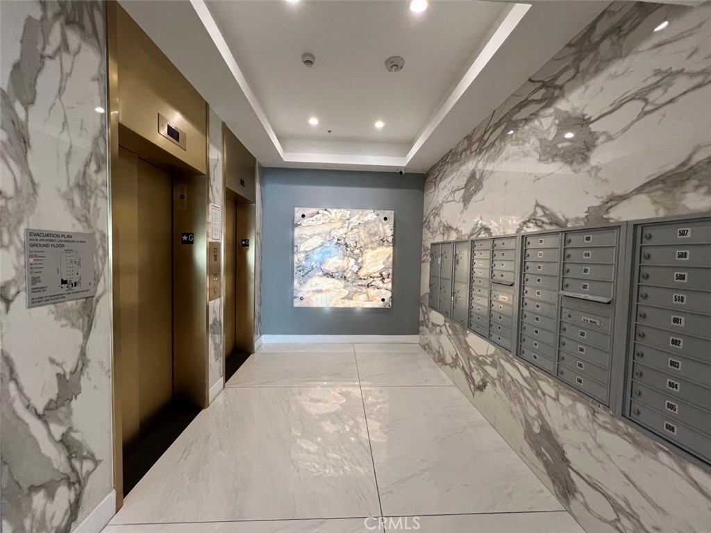 314 6th, Unit 506 Los Angeles, CA 90014 - Photo 12 of 12 a view of entryway with a hallway