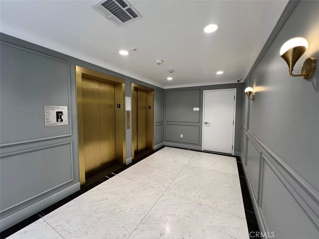 314 6th, Unit 506 Los Angeles, CA 90014 - Photo 10 of 12 a view of hallway with stairs