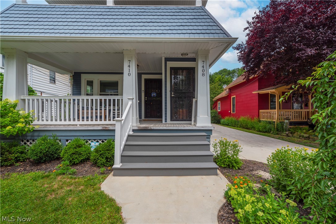 7408-7410 Rutledge Avenue Cleveland, OH 44102 - Photo 2 of 46 Property entrance featuring covered porch