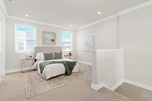 a bed room with a bed and a window