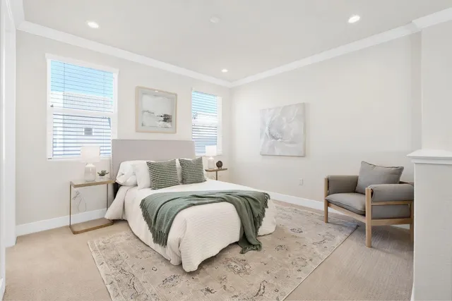 a bedroom with a bed and a couch