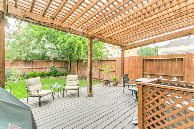 a patio with table and chairs
